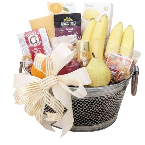 Send delicious fresh fruits of the season such as pears, apples, oranges and bananas, Godiva chocolate, fancy mixed nuts, soft baked lemon cookies, chocolate truffle bar with crunchy toffee, white and dark chocolate toffee & cherries, savory cheese biscuits, lemon zest almonds, chocolate truffles and almond sugar cookies, butterscotch caramels. Arranged in a beautiful metal bowl.