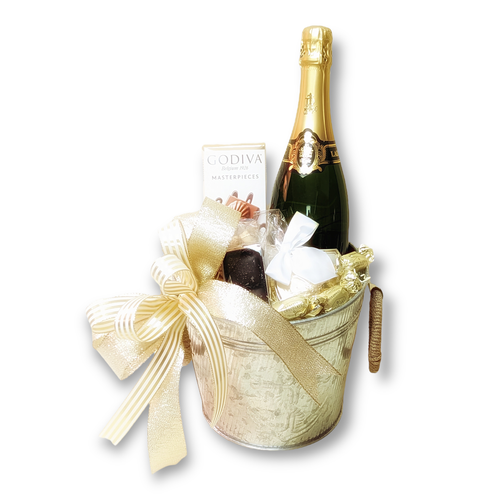Cheers! Time to celebrate and indulge with this beautiful and delicious arrangement, included are a bottle of French Brut champagne, dark chocolate espresso truffle bar, olive oil & sel gris sourdough flatbread bites, fig & olive tapenade, German  champagne milk chocolate bar , butterscotch caramels, Napa Valley cherry almond dark chocolate, fancy mixed nuts. Arranged in a beautiful metal champagne ice bucket.