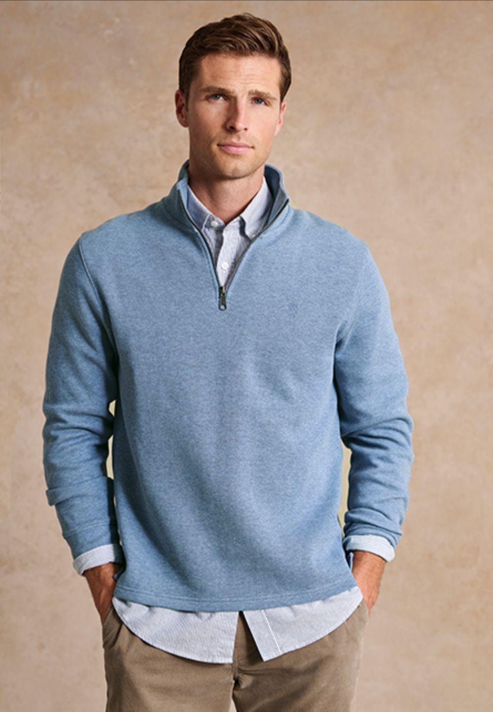 Two people in jumpers in the countryside