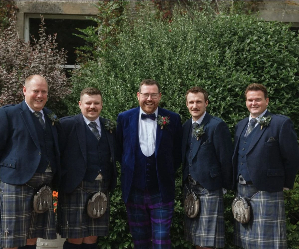 people wearing kilts