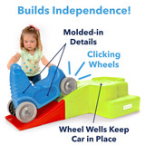 Coaster builds independence with easy reset; features clicking wheels and molded in wheel wells