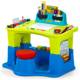 Creative kids table and attached stool has ample storage for art and sensory materials