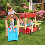 Simplay3 Sunny Slide and Climb Picnic Playhouse outside with kids playing and mom watching