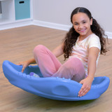 adolescent girl rocking in periwinkle blue extra large wobble disk