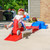 toddler girl riding down America 250 red white and blue roller coaster