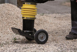Scheppach VS 1000 vibratory rammer tamper with steel protective frame and 6.5 HP engine for soil compaction.