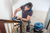 Bosch GET 55-125 Professional random orbit sander featuring a slim 18cm ergonomic handle and 125mm multi-hole sanding pad.