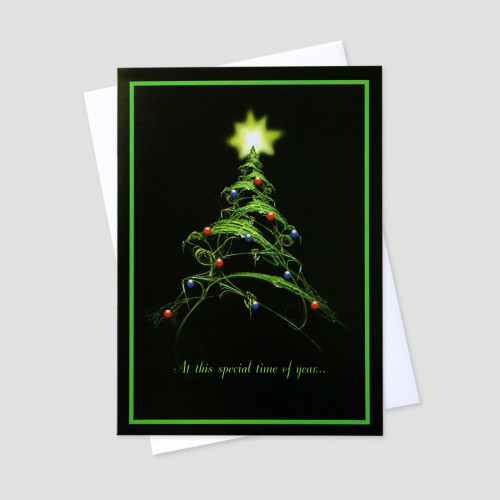 Professional Holiday greeting card with a graphic design decorated green fir tree against a black background and matching green border