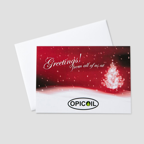 Professional Holiday greeting card featuring a snowy landscape with a white fir tree against a red background with white space to allow for company personalization