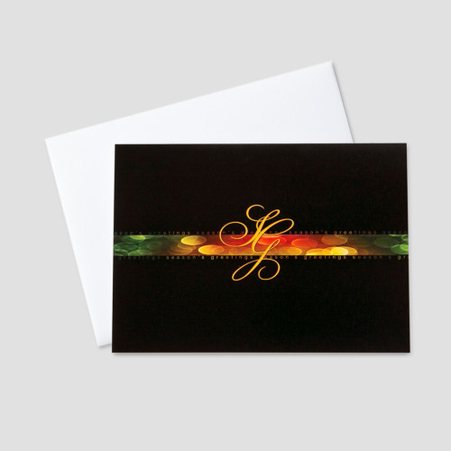 Professional Holiday greeting card with sg script letters for season's greetings on a black background