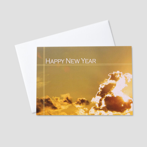 Client New Year greeting card featuring an image of sun rays peeking through clouds as if signifying new years' day