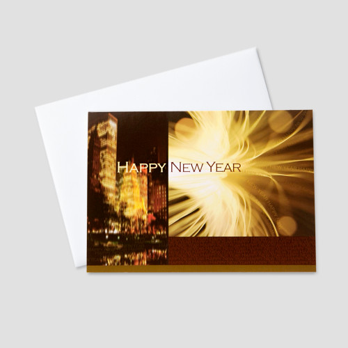 Client New Year greeting card featuring a city skyline at night with a happy new year message by a burst of golden fireworks