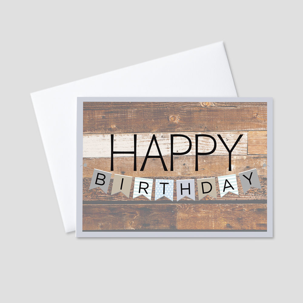 Corporate Birthday greeting card with a wood grain background and a Happy Birthday message spelled out in pastel colored banners