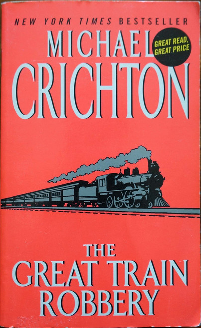 Lavish wealth and appalling poverty live side by side in Victorian London--and Edward Pierce easily navigates both worlds. Rich, handsome, and ingenious, he charms the city's most prominent citizens even as he plots the crime of his century, the daring theft of a fortune in gold.
But even Pierce could not predict the consequences of an extraordinary robbery that targets the pride of England's industrial era: the mighty steam locomotive.  Based on remarkable fact, and alive with the gripping suspense, surprise, and authenticity that are his trademark, Michael Crichton's classic adventure is a breathtaking thrill-ride that races along tracks of steel at breakneck speed. Lavish wealth and appalling poverty live side by side in Victorian London--and Edward Pierce easily navigates both worlds. Rich, handsome, and ingenious, he charms the city's most prominent citizens even as he plots the crime of his century, the daring theft of a fortune in gold.
But even Pierce could not predict the consequences of an extraordinary robbery that targets the pride of England's industrial era: the mighty steam locomotive.  Based on remarkable fact, and alive with the gripping suspense, surprise, and authenticity that are his trademark, Michael Crichton's classic adventure is a breathtaking thrill-ride that races along tracks of steel at breakneck speed.