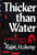 In the dreary, cold pre-Easter lull, Mrs. Merkin develops a case of persnicketiness.  Someone has stolen from the church's offering box.  The meat she has taken from the freezer and jars of her preserves have vanished.  Footprints on the kitchen floor.  But when she and reluctant Father Dowling track the footprints through the snow, they come upon something more horrendous than either Mrs. Murkin or Father Dowling had anticipated: a body in a pool of blood.

Thus begin the dire events that shatter the seemingly peaceful innocence of Fox River, Illinois.  Murder follows murder.  Shades of drug-trafficking and organized crime loom large and menacing.  The police press hard and Father Dowling is himself endangered before the murderous attacker is put to ground.

But, as in Ralph McInerny's other Dowling mysteries, the chill of murder and of weather, of life's harsh realities, is thawed and warmed by the sunlight and wit of the writing and cozy intimacy of life-like characters.  Besides old friends--Mrs. Murkin, of course; Phil Keegan; Cy Horvath; and, above all, the pervasive quality of Roger Dowling himself--we meet many new fascinating persons: a female cop and a sharp old lady, both of whom behave like veteran scene-stealers; a writer of church pamphlets; some aging, some tough, some smooth--too many characters to be even briefly noted.  Thicker Than Water, the sixth Father Dowling Mystery, may be the best of all.
