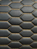 Quilted automotive grade black vinyl with gold-bronze stitching
