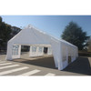 Angled side view of Heavy Duty Canopy Event Tent with Windows, fully assembled in a street.