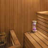 Image of Pine Wood Sauna Hourglass Sand Timer placed on a sauna bench.