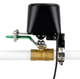 Smart valve controller installed on a compatible green lever quarter-turn ball valve, demonstrating compatibility with multiple standard valve handle styles.