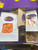 Princeola Treats Love Box open showing cheese and caramel popcorn bags, caramel pecans, salted caramel candies, and surprise gift in purple packaging.