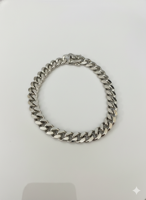 men's 925 Sterling Silver Cuban Bracelet 9" Rhodium Finished shown on flat surface Father's Day
