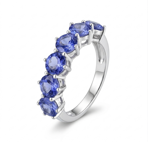 Close-up of the secure prong setting and 925 sterling silver on a natural tanzanite band.