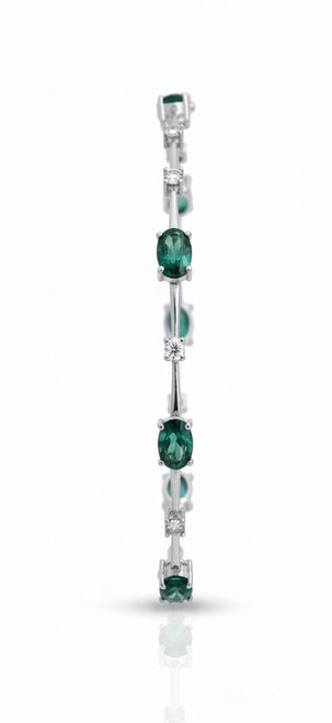 Close up of natural chrome diopside gemstones set in 925 sterling silver bracelet Atelier Gems
