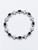 Close up of genuine natural black opal stones set in Atelier Gems 925 sterling silver bracelet