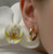 Close-up view of 925 sterling silver Hoop earrings with rhodium finish showing brilliant shine Atelier Gems
