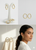 Pair of 925 sterling silver Hoop earrings displayed on jewelry stand elegant minimalist style