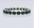 Rhodium finished sterling silver peridot bracelet
