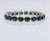 Rhodium finished sterling silver peridot bracelet