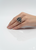 Rhodium finished sterling silver black opal gemstone ring Model hands