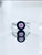 Side view of rose quartz ring with rhodium finished setting