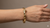 14K yellow gold canyon bangle worn on wrist elegant styling
