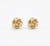 14K yellow gold knot stud earrings front view polished finish