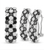 One earring facing forward and the second rotated 90 degrees to show the hinge mechanism and the thickness of the checkerboard pavé.