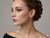 Model wearing earrings Pavé set earrings
