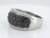 Side profile of a luxury white gold diamond band showing the thickness of the setting and the sparkle of 1.89ct black and white pavé stones.
