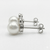 Side view of EFFY freshwater pearl and bezel diamond drop earrings in 14K white gold.