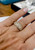 Close up effy lifestyle shot of a premium 1.37 CT pavé diamond dome ring worn on a finger.Atelier Gems