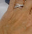 Close-up of EFFY Duo two-tone diamond crossover ring worn on hand.