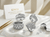 EFFY white gold pavé diamond wave ring displayed in a jewelry showcase