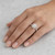 EFFY oval diamond cluster ring with rose gold halo worn on a model’s finger