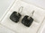Angled view of EFFY black and white diamond drop earrings in 14K white gold.