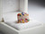 EFFY 14K rose gold multi-color sapphire and diamond statement ring displayed in a white velvet box