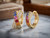 Side profile view of EFFY 14K yellow gold multi-sapphire and diamond hoop earrings showcasing hinge closure