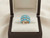 EFFY 14K yellow gold turquoise ring showcased inside a luxury branded presentation box