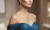 Professional lifestyle shot of model wearing the EFFY turquoise and diamond pendant necklace