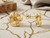 EFFY 14K yellow gold diamond floral earrings displayed inside with beautiful surface